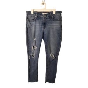 Levi’s 711 Skinny Jeans Medium Wash Distressed Raw Hem  Womens Size 32